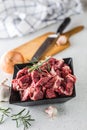 Beef. Raw sliced beef meat garlic onion salt pepper and rosemary Royalty Free Stock Photo