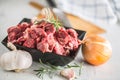 Beef. Raw sliced beef meat garlic onion salt pepper and rosemary Royalty Free Stock Photo