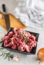 Beef. Raw sliced beef meat garlic onion salt pepper and rosemary Royalty Free Stock Photo