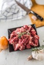 Beef. Raw sliced beef meat garlic onion salt pepper and rosemary Royalty Free Stock Photo