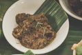 Beef Rendang Beef cubes cooked in a rich coconut and spice mix till tender perfection