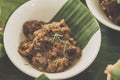 Beef Rendang Beef cubes cooked in a rich coconut and spice mix till tender perfection