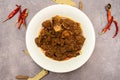 Beef rezala, krahi, kala bhuna, korma, qorma with red chilli served in dish isolated on grey background top view food