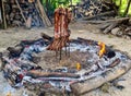 Beef rib barbecue with ground fire
