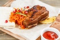 Beef ribs grill. Serving on a wooden Board on a rustic table. Barbecue restaurant menu, a series of photos of different Royalty Free Stock Photo