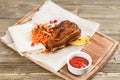 Beef ribs grill. Serving on a wooden Board on a rustic table. Barbecue restaurant menu, a series of photos of different Royalty Free Stock Photo