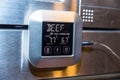 Beef roasting meat temperature conrol unit on silver oven