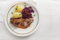 Beef roll with red cabbage and potatoes, german meat roulade stu Royalty Free Stock Photo