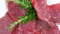 Beef with rosemary sprigs Royalty Free Stock Photo