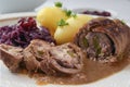 Beef roulade with red cabbage, potatoes and sauce, german meat r Royalty Free Stock Photo