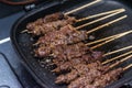 Grilled beef skewers or sate or satay on a pan