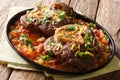 Beef shank Ossobuco alla Milanese with gremolata and spicy sauce Royalty Free Stock Photo