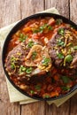 Beef shank Ossobuco alla Milanese with gremolata and spicy sauce