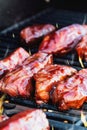 Beef Short RIbs with BBQ Sauce on a Hot Grill Royalty Free Stock Photo