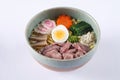 Beef shoyu ramen on white background, beef with japanes