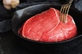 Beef sirloin in iron skilet Royalty Free Stock Photo