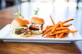 beef sliders with a side of sweet potato fries Royalty Free Stock Photo