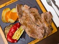 Beef steak with baked potatoes, vegetables, romesco Royalty Free Stock Photo