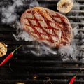 Beef Steak on Barbecue Flames Grill Background