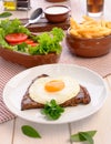 Beef steak Bife a Cavalo - Brazilian traditional food Steaks, White rice, farofa and salad