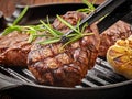 Beef steak on cooking pan Royalty Free Stock Photo