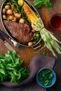 Beef steak fried corn vegetables top view Dinner table Royalty Free Stock Photo