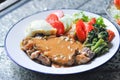 beef steak in gravy sauce or barbecued beef or grilled beef and mashpotato ,vegetable salad Royalty Free Stock Photo