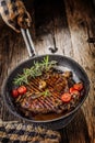 Beef steak. Grill beef flank steak with rosemary musrooms and to Royalty Free Stock Photo