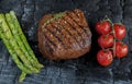 Beef steak grilled with asparagus tomatoes spice