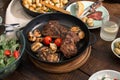 Beef steak grilled with grilled vegetables, salad and potatoes Royalty Free Stock Photo