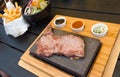 Beef steak on lava stone