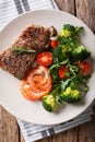 Beef steak with prawns and broccoli, tomatoes, arugula closeup o Royalty Free Stock Photo