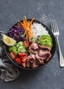 Beef steak, rice and vegetable power bowl. Healthy balanced food concept. On a dark background