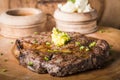 Beef steak served with mashed potato and gravy with melting butter Royalty Free Stock Photo