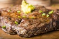 Beef steak served with mashed potato and gravy with melting butter Royalty Free Stock Photo