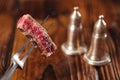 Beef steak Slice on vintage meat fork