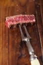 Beef steak Slice on vintage meat fork