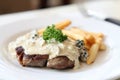 Beef steak with white sauce Royalty Free Stock Photo