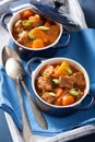 Beef stew with potato and carrot in blue pots Royalty Free Stock Photo