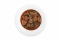 Beef stew in tomato sauce traditional Georgian dish chashushuli white background top view