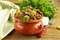 Beef stew with vegetables and herbs in a clay pot Royalty Free Stock Photo