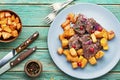 Beef stew with pumpkin on wooden table Royalty Free Stock Photo