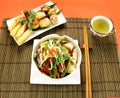 Beef Stirfry And Dimsums Royalty Free Stock Photo