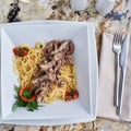 Beef stroganoff with spaghettini in bowl Royalty Free Stock Photo
