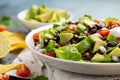 Beef Taco salad with romaine lettuce, avocado, tomato salsa, black bean and tortilla chips. Mexican healthy food Royalty Free Stock Photo