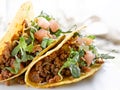 Beef tacos with lettuce cheese and tomato Royalty Free Stock Photo