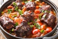 Beef tail oxtail stew cooked in traditional spanish food rabo de toro closeup on a pot on the table. Horizontal Royalty Free Stock Photo