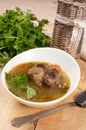 Beef tail soup with parsley and barley Royalty Free Stock Photo