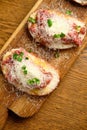 Beef tartar with salad and garlic toast on dark bread Royalty Free Stock Photo