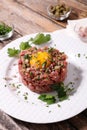 French gastronomy with egg yolk and minced beef Royalty Free Stock Photo